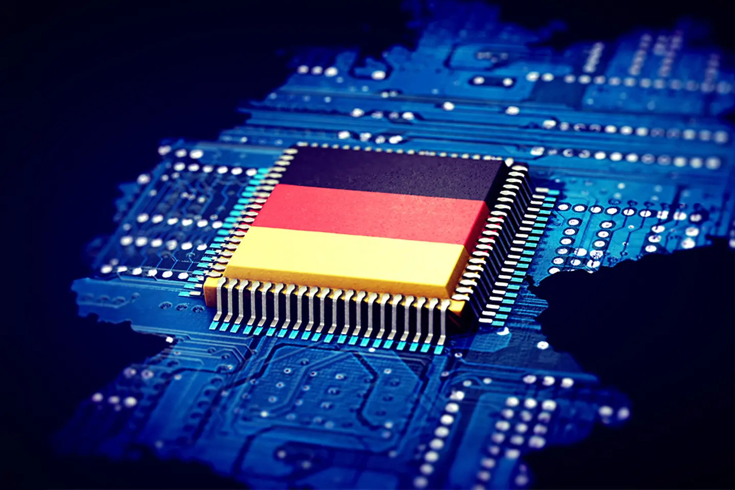 A blue map of Germany designed like a circuit board, featuring a microchip in the colors of the German flag