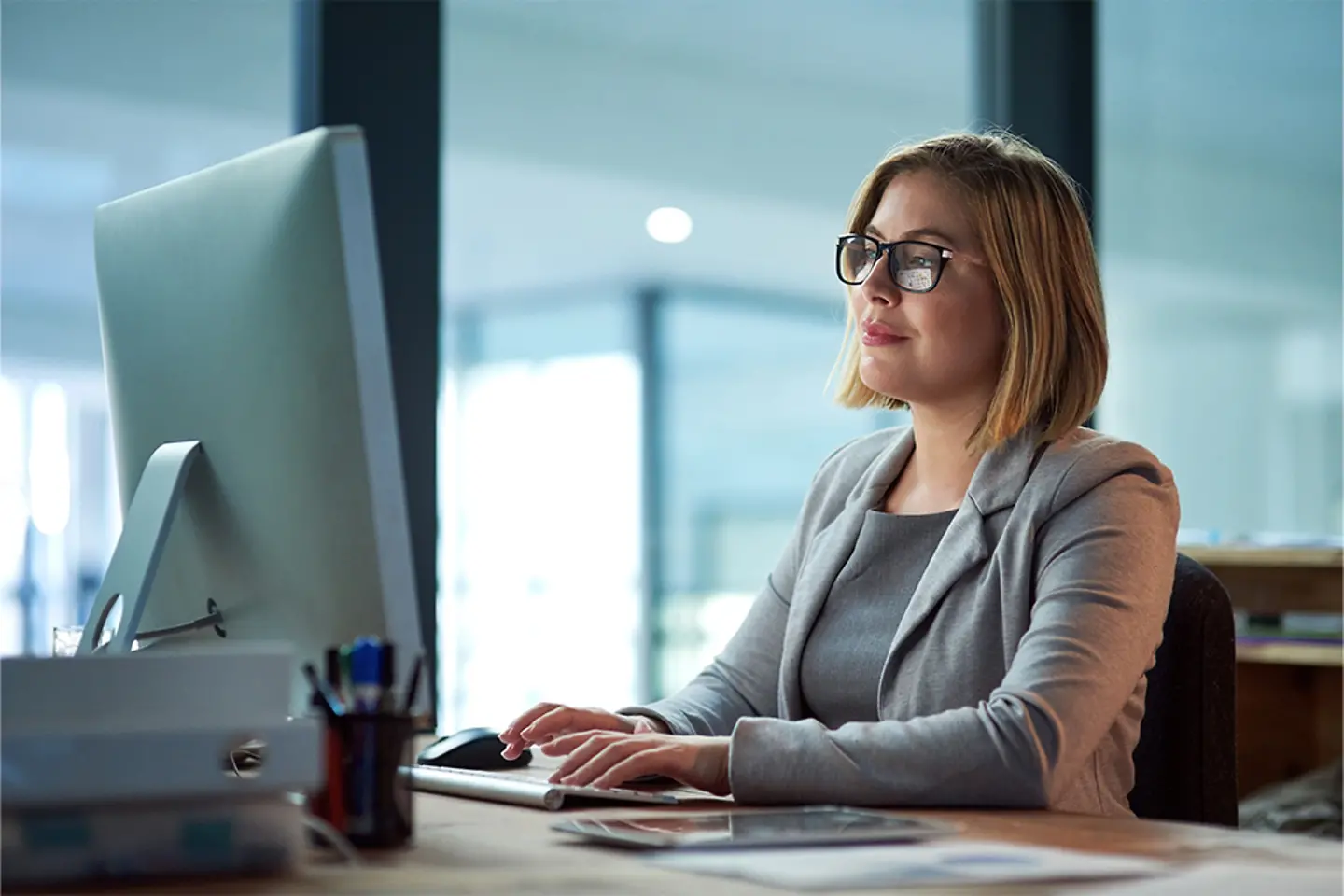 Office worker in front of her computer
