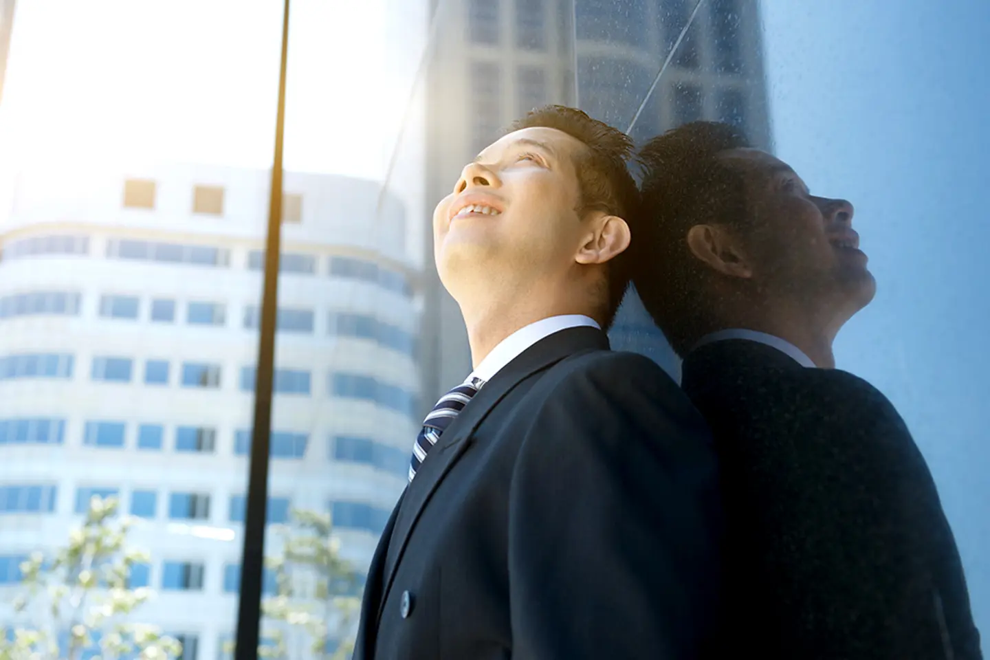 Businessman smiling and looking up